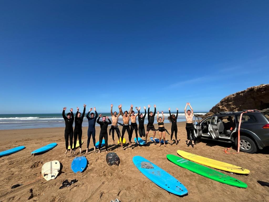 Group surf day on the beach