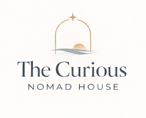 The Curious Nomad House logo