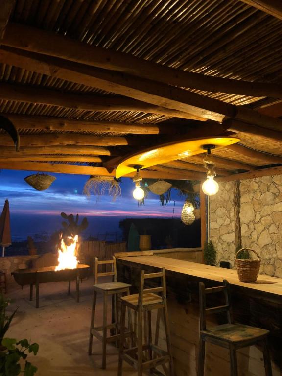 Whitewashed terrace corner with ocean light in Morocco