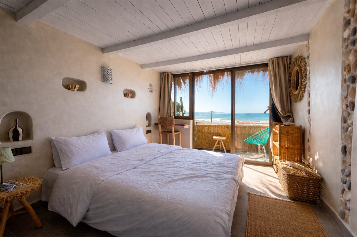 Ocean-view room at The Curious Nomad House Morocco Edition