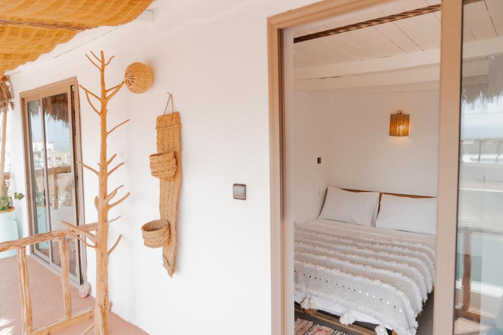 Private room entrance with natural textures in Morocco